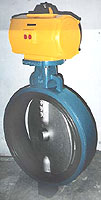 Butterfly valves control flow through a circular disc or vane by turning the valve's pivot axis at right angles to the direction of flow in the pipe. They are normally used as throttling valves to control flow.